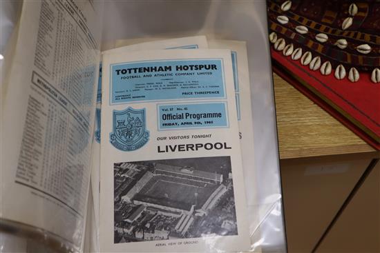 A large collection of Tottenham Hotspur memorabilia including programmes, official season handbooks, ticket stubs and a rattle,